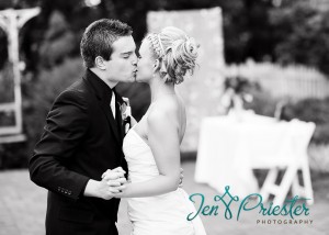 Bride Groom Kissing Michigan Newborn Baby Photographer 300x214