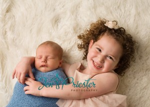 Mi Newborn Portraits 300x214