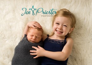 Newborn And Sibling Sister Saginaw Photographer 300x214