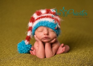Newborn Michigan Baby Boy Sleeping Poses Dr. Seuss Newborn Knit Hat 300x214