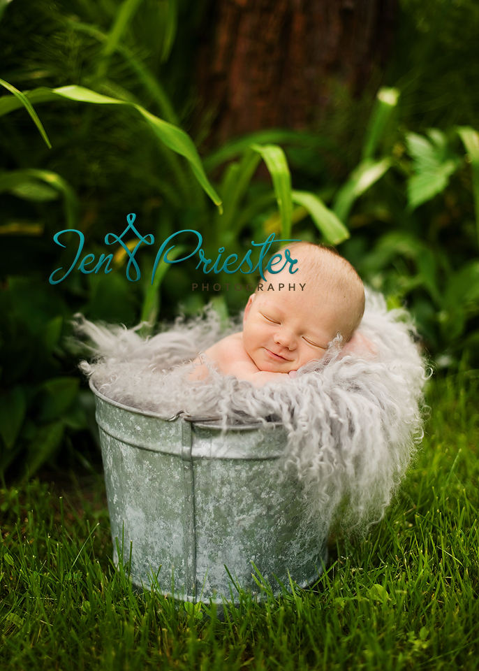 Smiling Newborn Posed Bucket Outside Michigan Photos