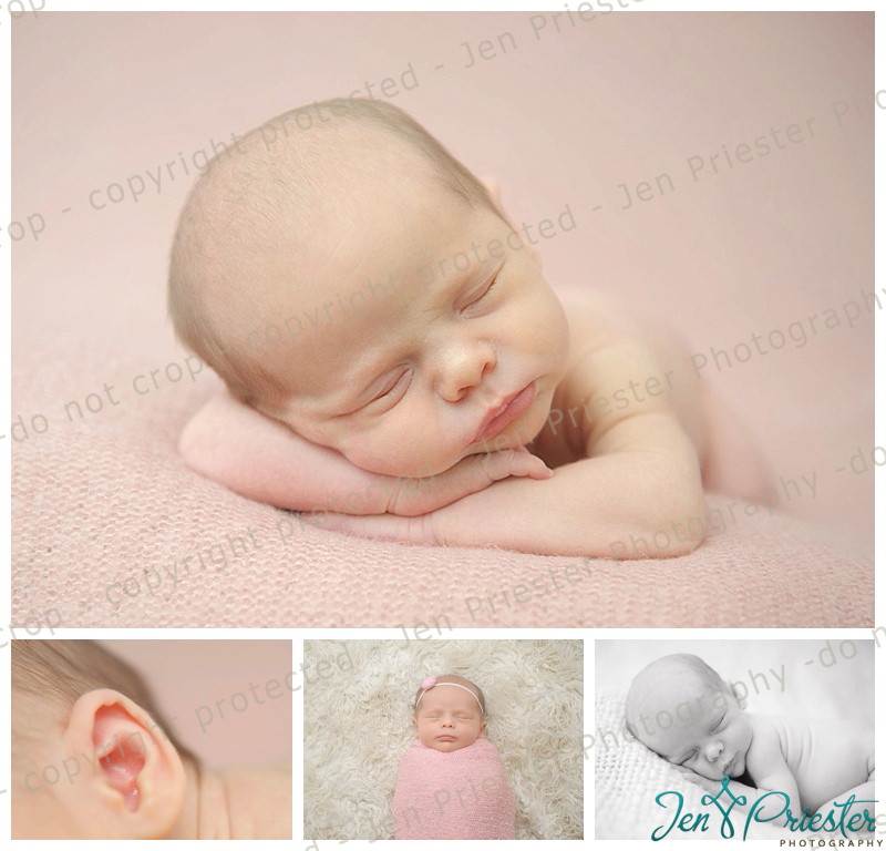Newborn girl sleeping peacefully on blanket