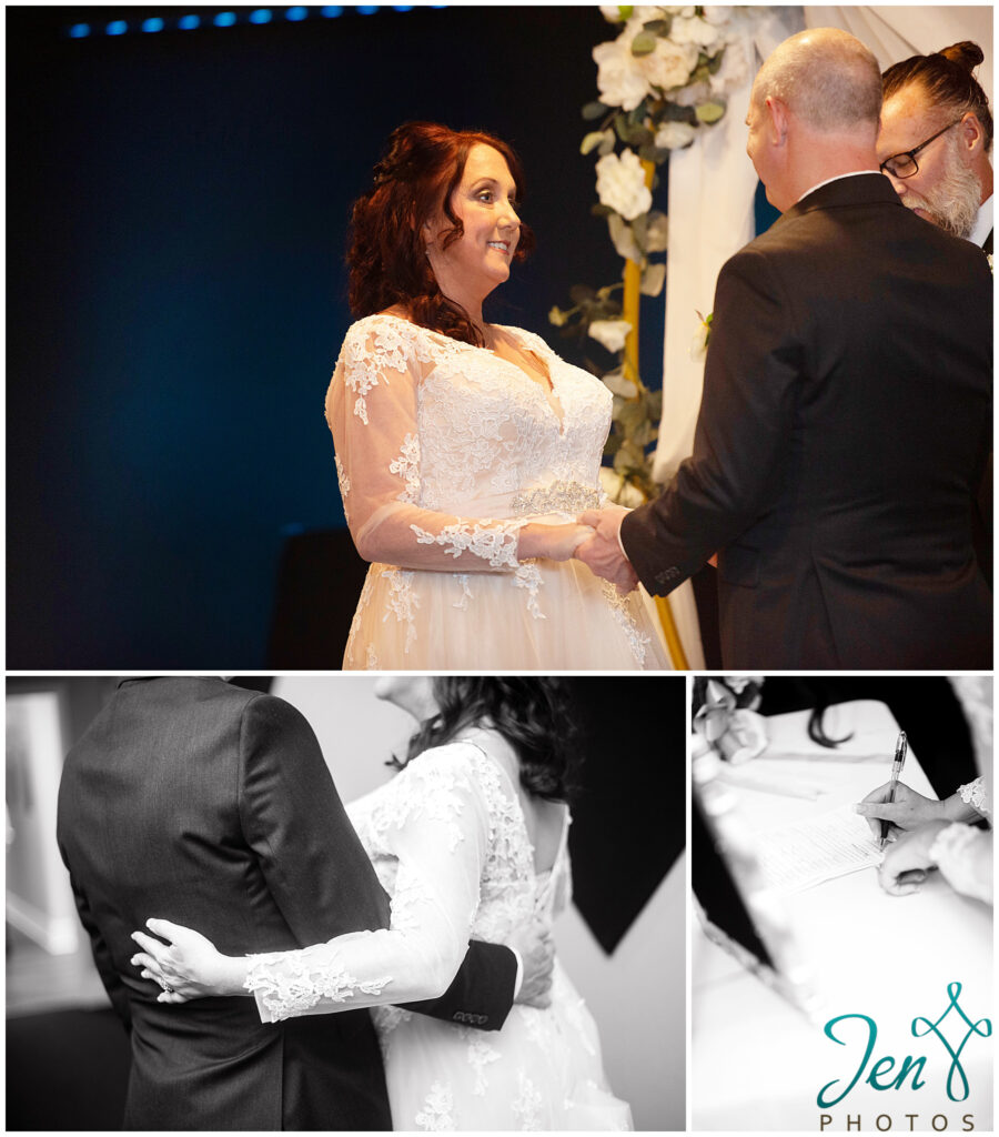 a bride and groom at their ceremony and signing the marriage certificate
